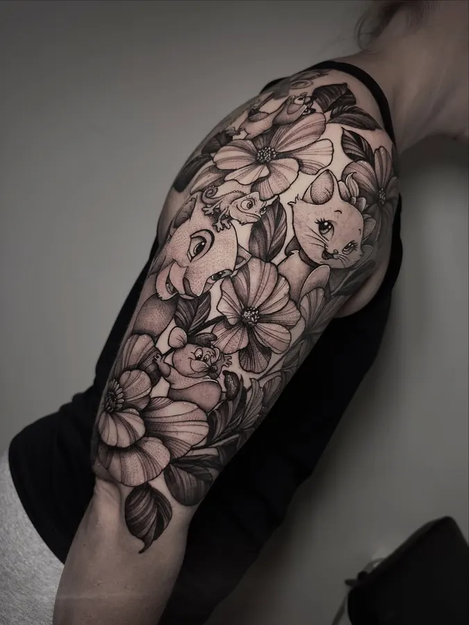 Detailed black-and-grey floral sleeve.